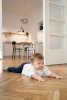 full-shot-cute-baby-laying-floor-bn.jpg